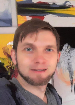 K.