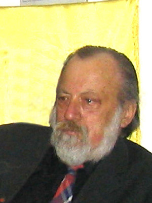M.