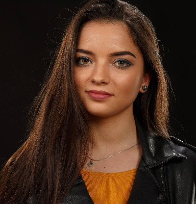 S.