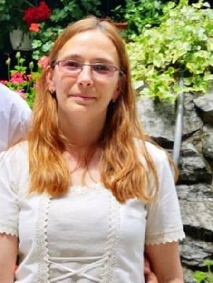 M.