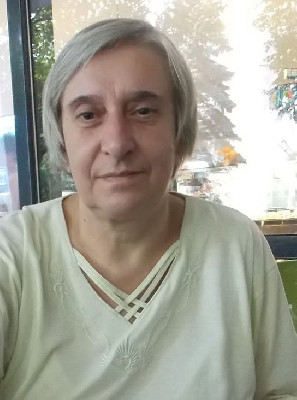 M.